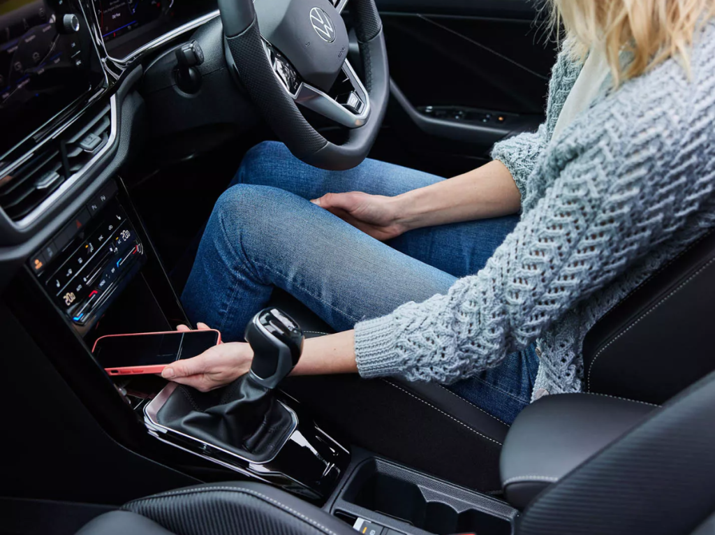 Women in front seat phone
