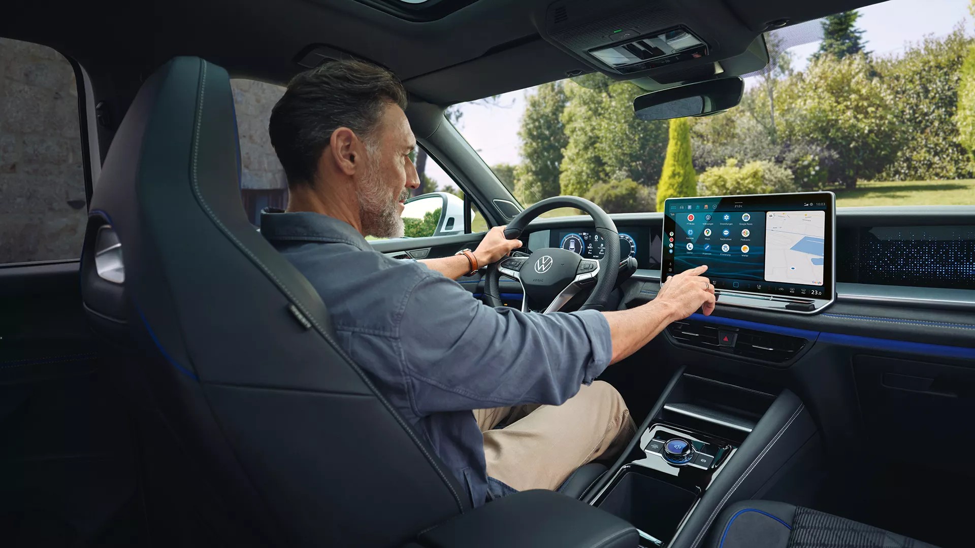 Tayron interior view man using display